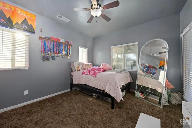 a view of swimming pool with outdoor seating