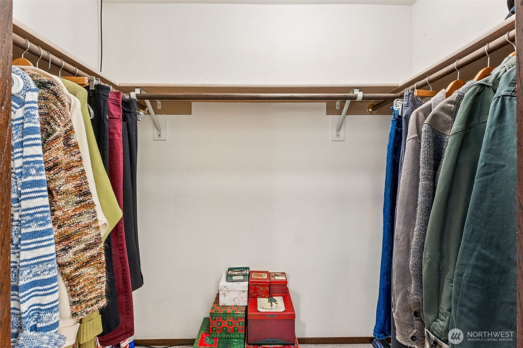 34609 4th Place South Federal Way, WA 98003 - Photo 24 of 38 a view of walk in closet with clothes and shoes