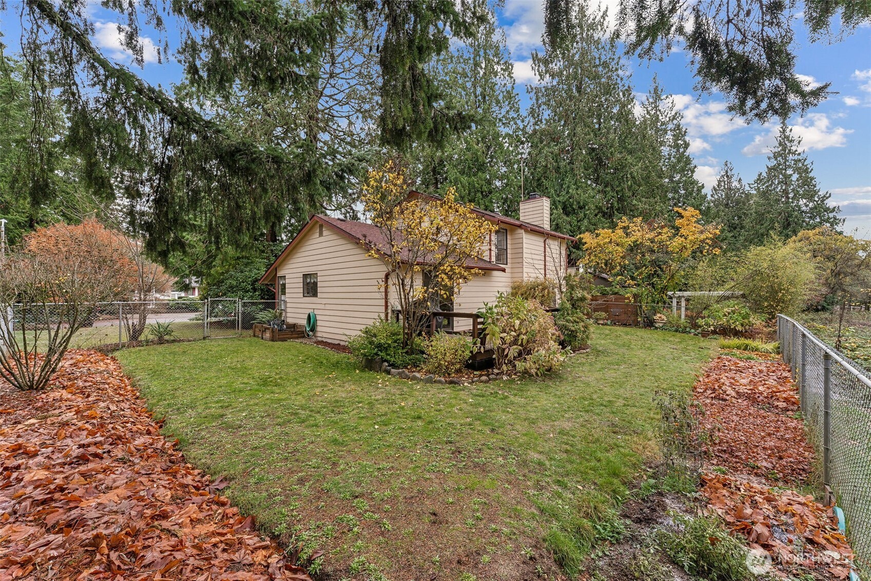 34609 4th Place South Federal Way, WA 98003 - Photo 31 of 38 a view of a house with a yard