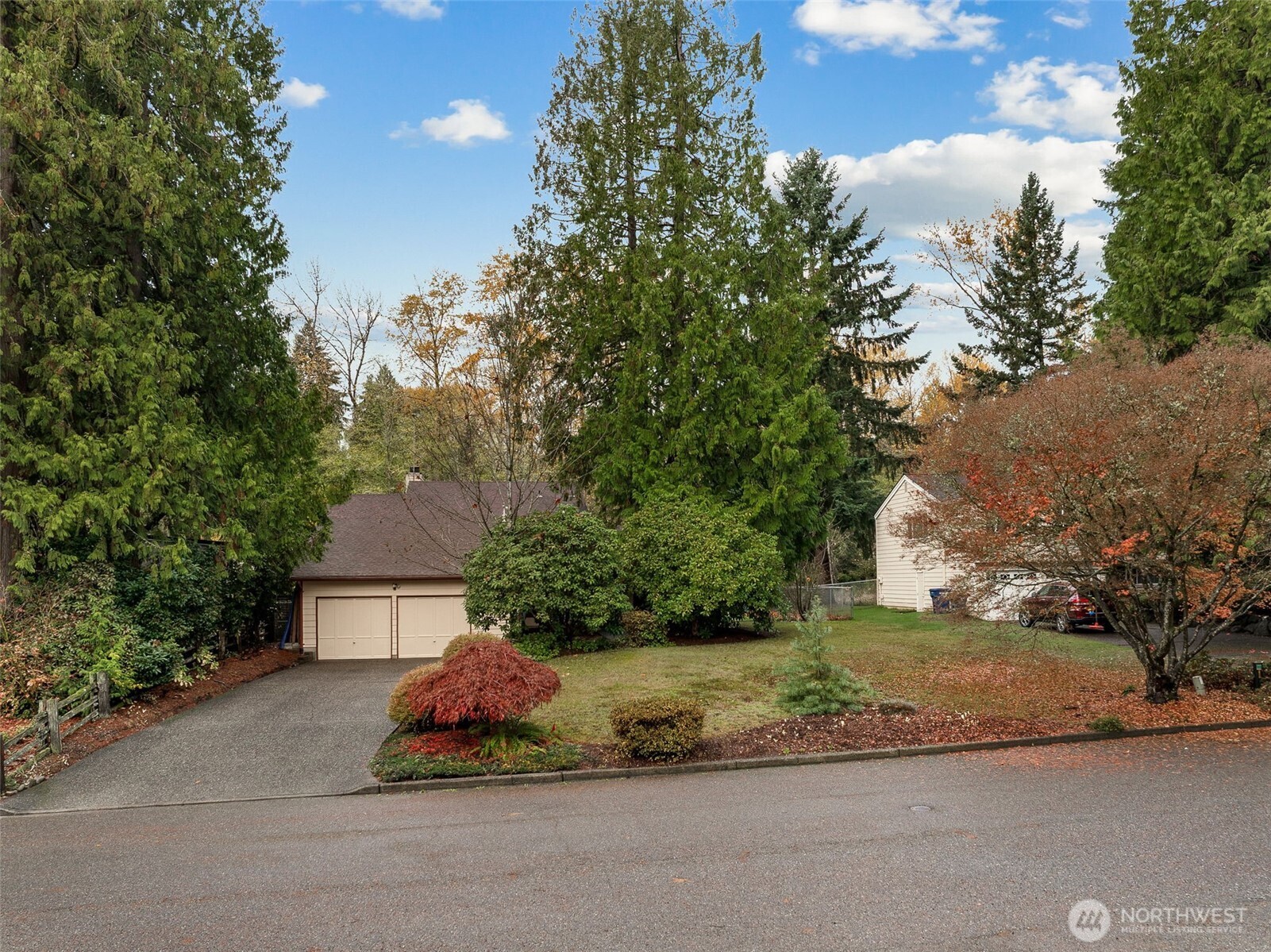 34609 4th Place South Federal Way, WA 98003 - Photo 4 of 38 a front view of a house with a yard and trees