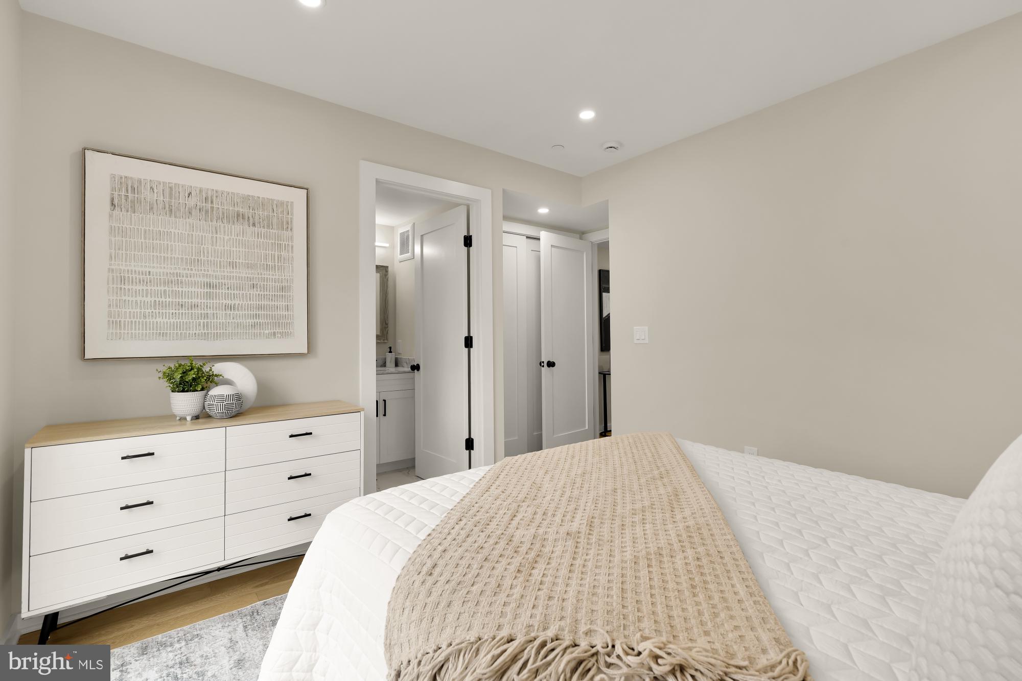 2606 41st Street Northwest, Unit 6 Washington, DC 20007 - Photo 14 of 25 a bedroom with a bed and a window