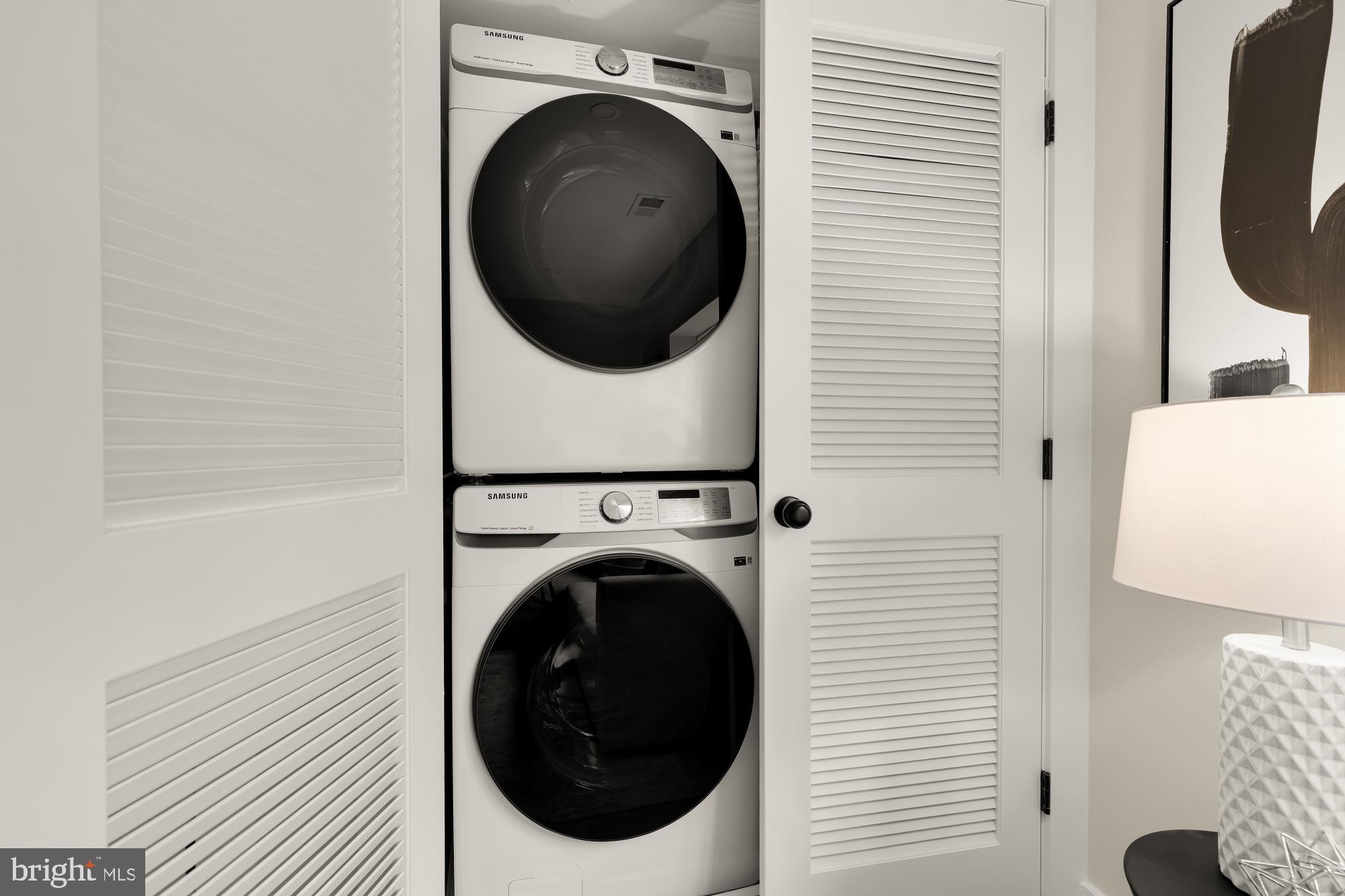 2606 41st Street Northwest, Unit 6 Washington, DC 20007 - Photo 23 of 25 a view of a hallway with washer and dryer