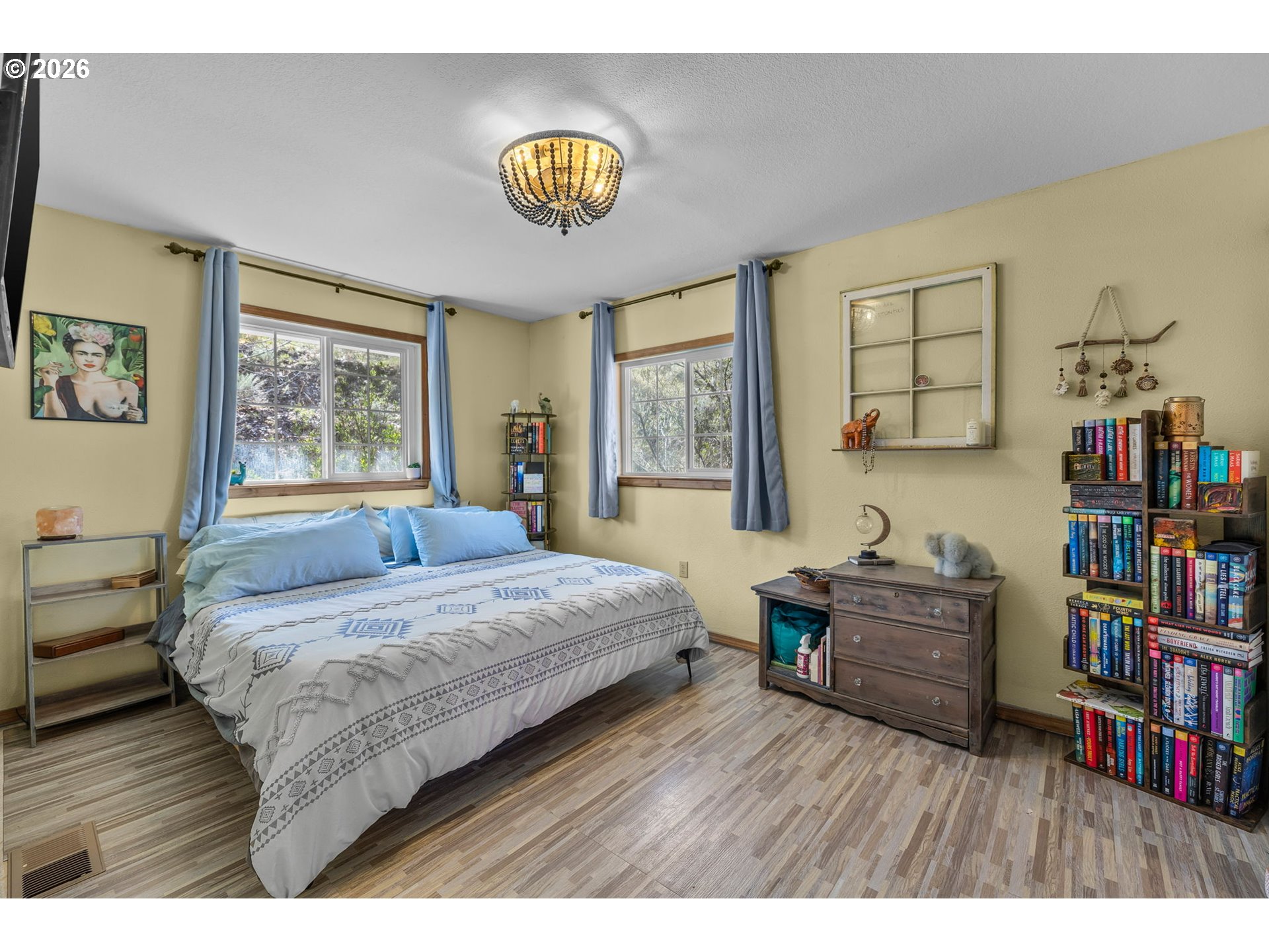 27374 Bumpy Road John Day, OR 97845 - Photo 11 of 45 a bedroom with a bed and a book shelf