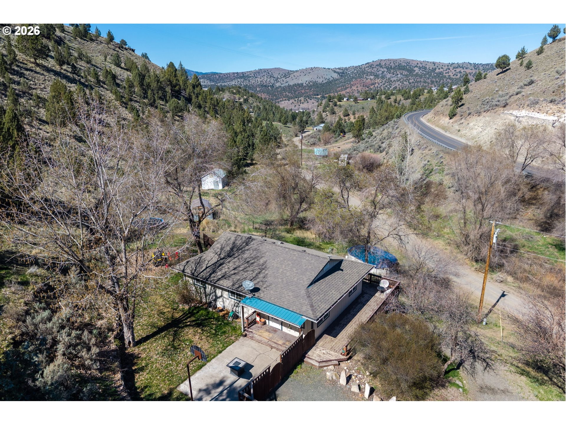 27374 Bumpy Road John Day, OR 97845 - Photo 34 of 45 an aerial view of a house with a mountain