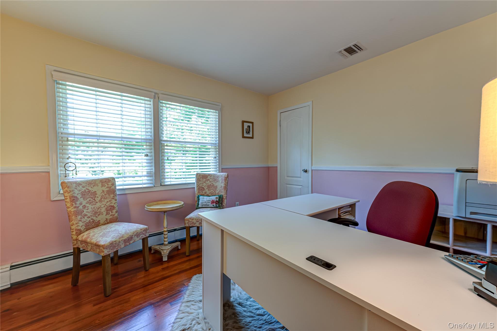 3 Thompson Hill Road St. James, NY 11780 - Photo 18 of 34 a living room with furniture and a large window