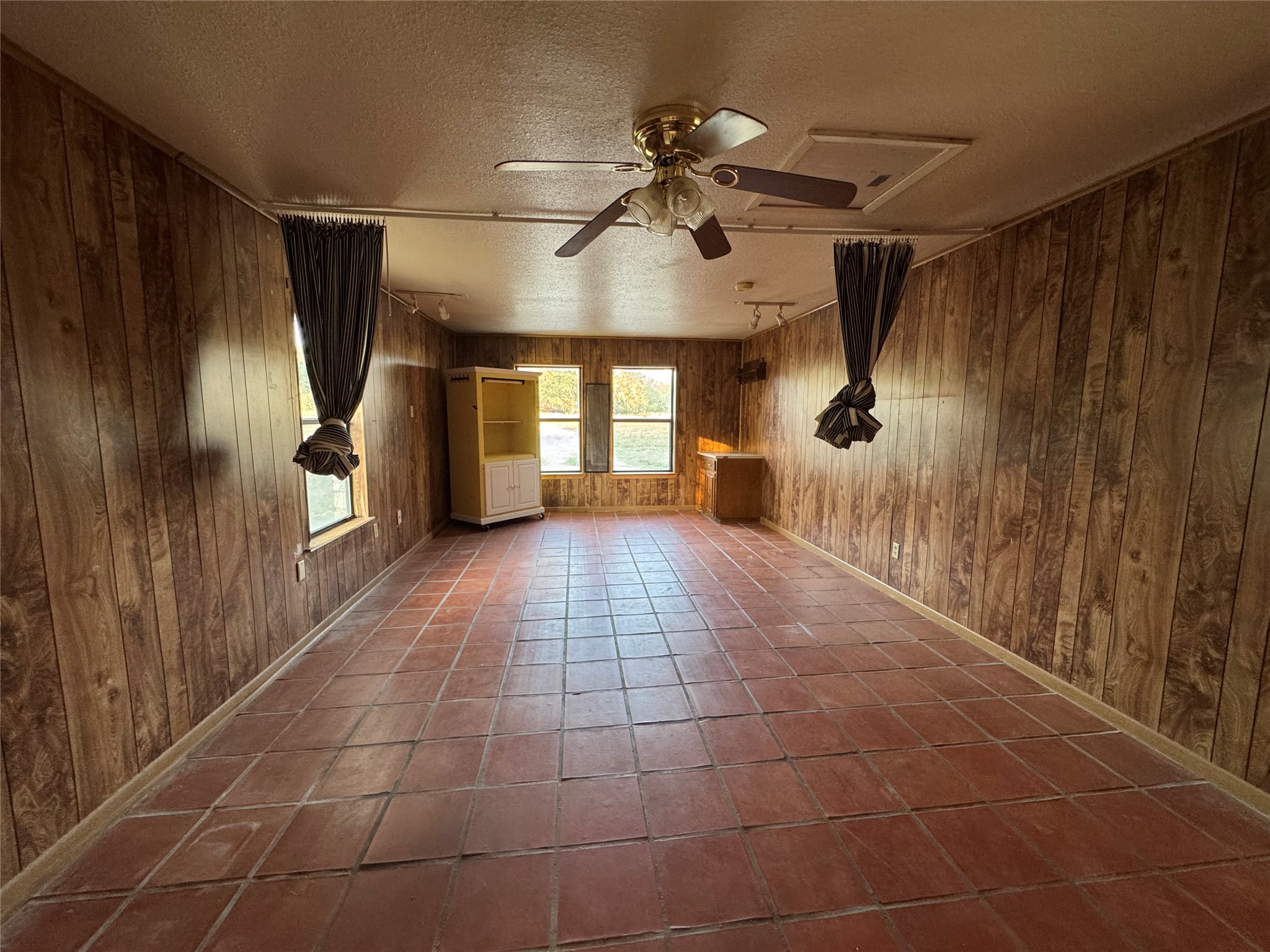 163 Robinson Road Lockhart, TX 78644 - Photo 14 of 21 a view of a hallway with wooden floor