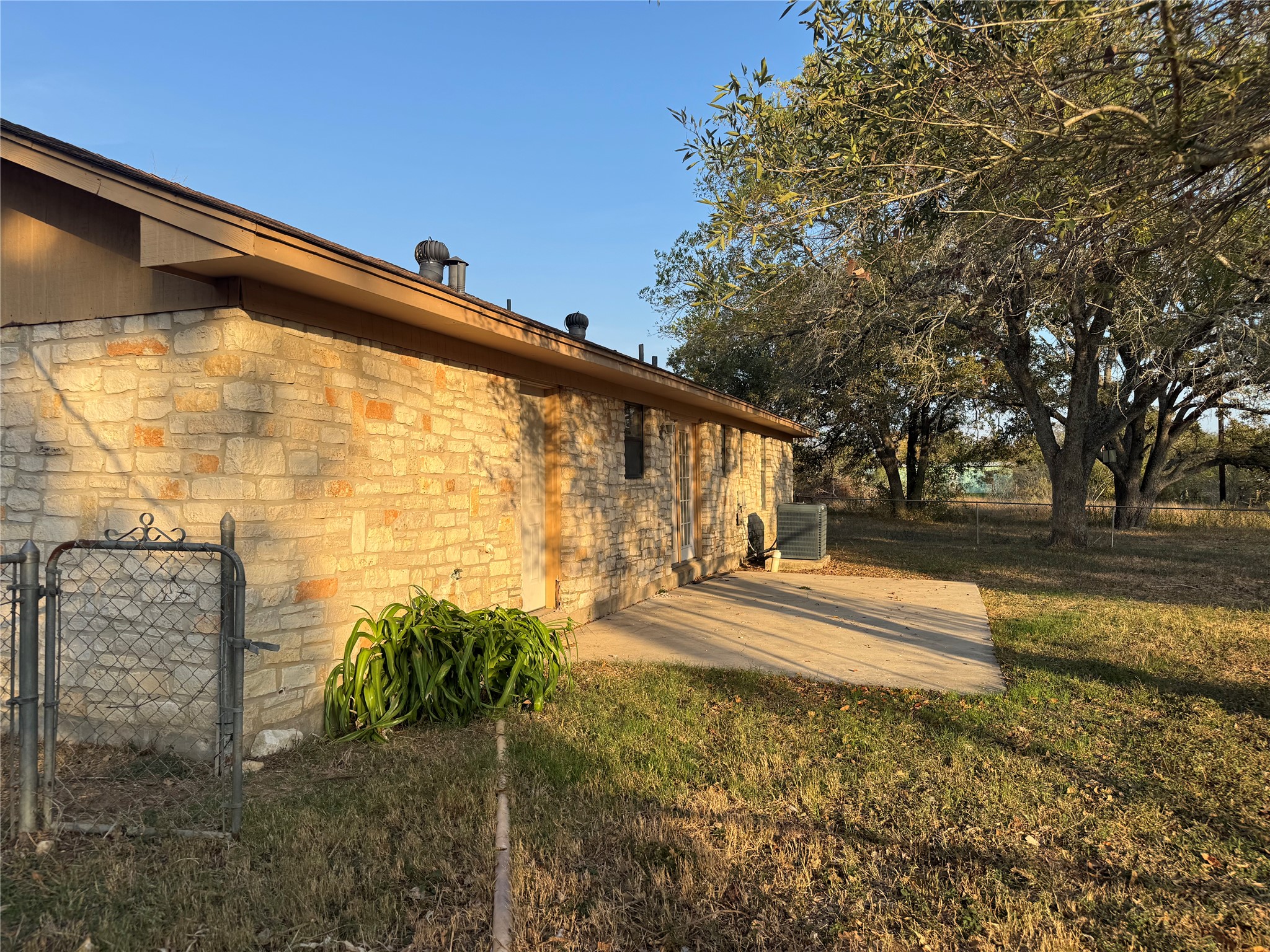 163 Robinson Road Lockhart, TX 78644 - Photo 21 of 21 a view of back yard of the house