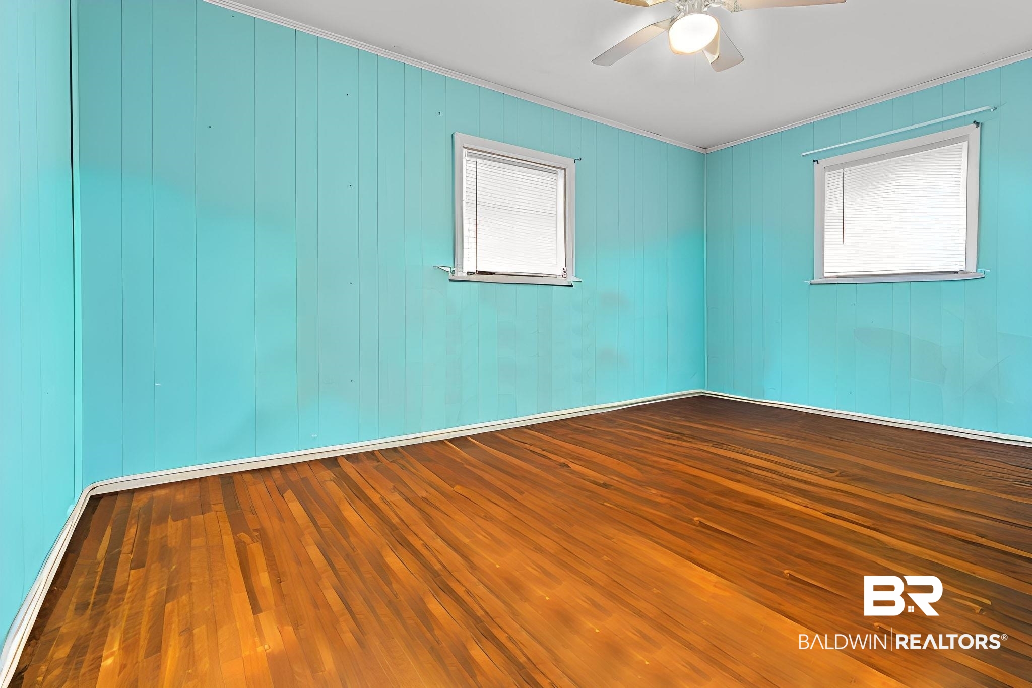 305 Alpine Street Mobile, AL 36611 - Photo 16 of 21 Spare room with hardwood / wood-style flooring, ceiling fan, and ornamental molding