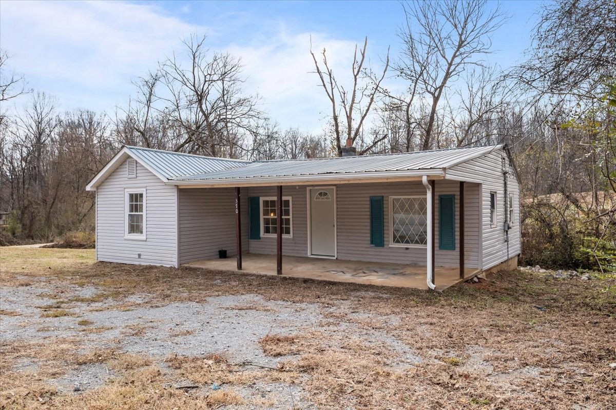 370 Main Street White Bluff, TN 37187 - Photo 22 of 29 a view of a house with a yard