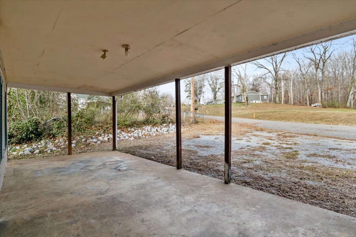 370 Main Street White Bluff, TN 37187 - Photo 23 of 29 a view of an empty room and window with an ocean view