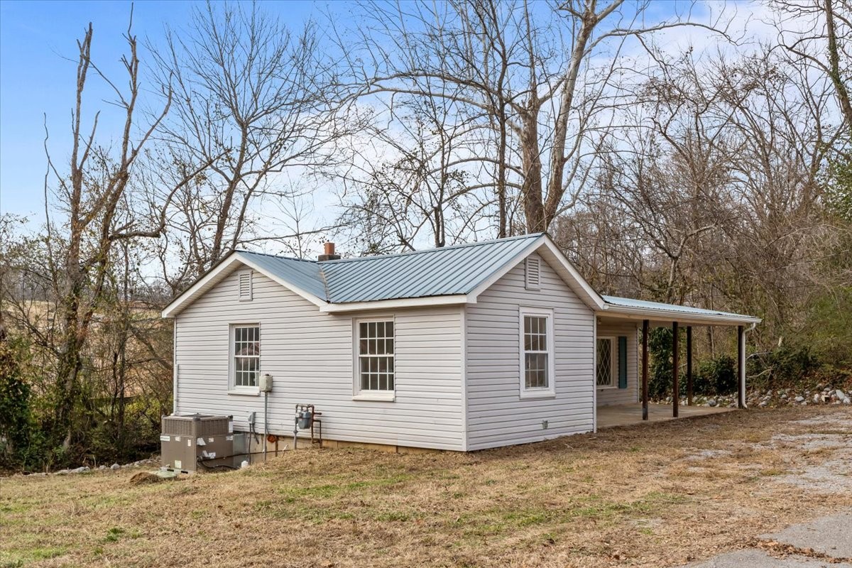 370 Main Street White Bluff, TN 37187 - Photo 24 of 29 a front view of a house with a yard