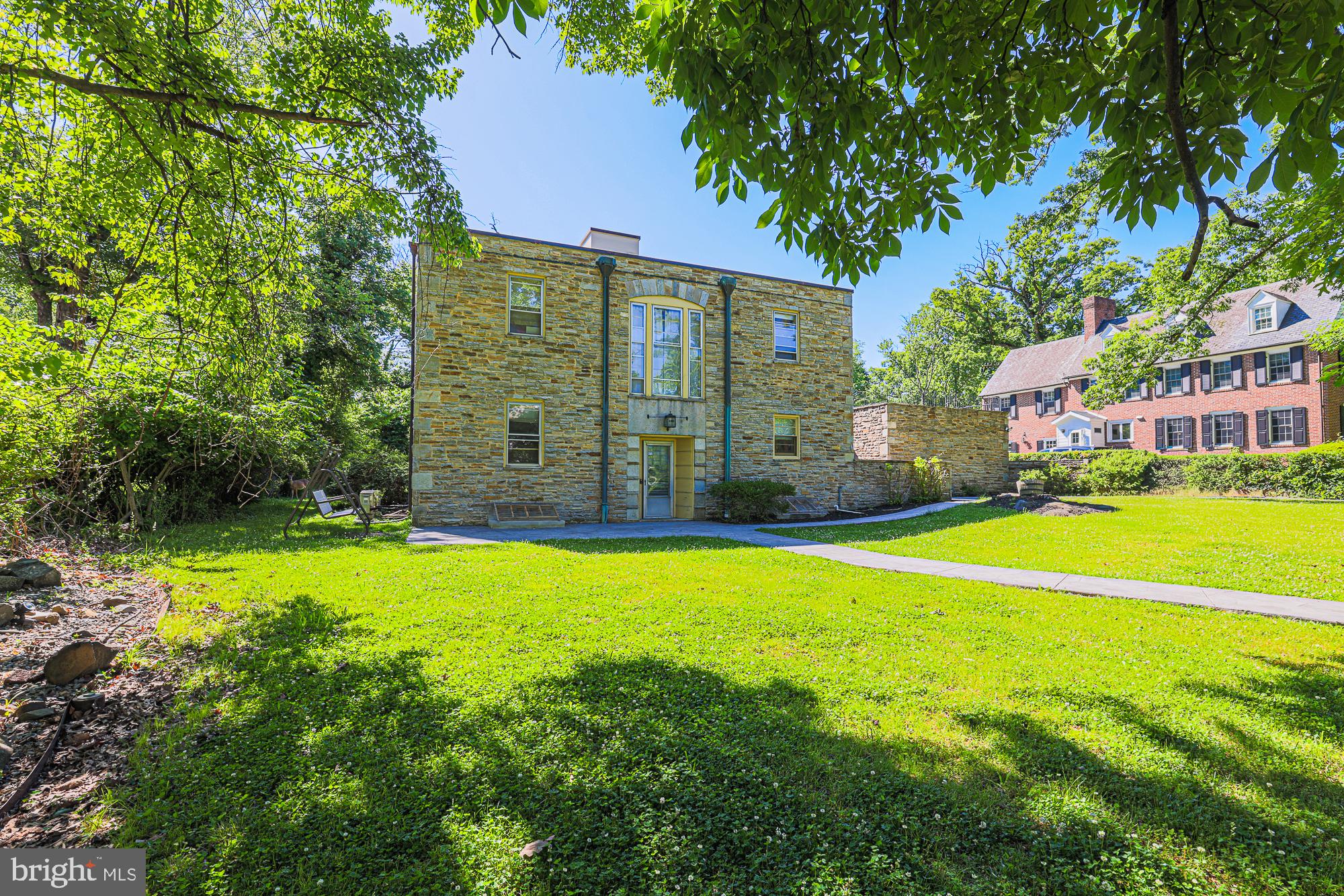 3305 Bancroft Road Baltimore, MD 21215 - Photo 4 of 61 Charming stone home in lush greenery.