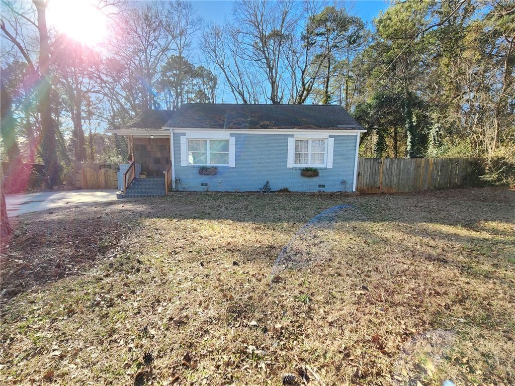 1357 Peachcrest Road Decatur, GA 30032 - Photo 1 of 1 a front view of a house with a yard