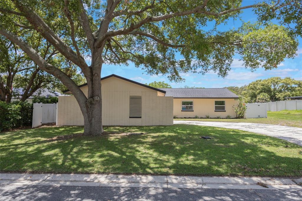 725 Laurel Way Casselberry, FL 32707 - Photo 1 of 1 a house view with a garden space
