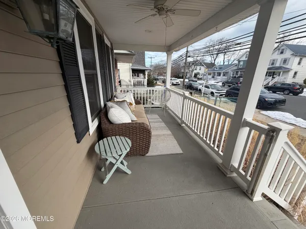 a view of a livingroom with furniture and windows