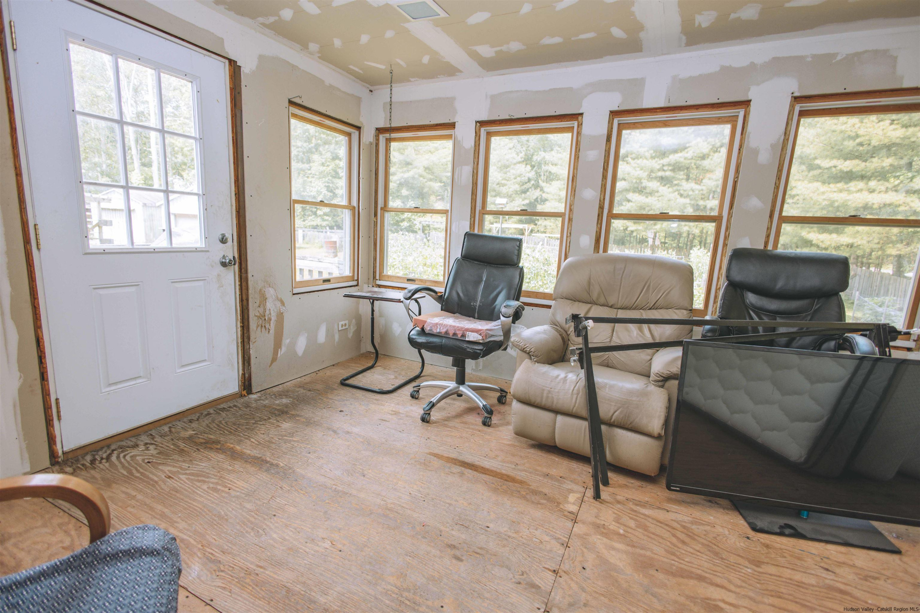 186 Patch Road Saugerties, NY 12477 - Photo 13 of 34 a living room with furniture and a window