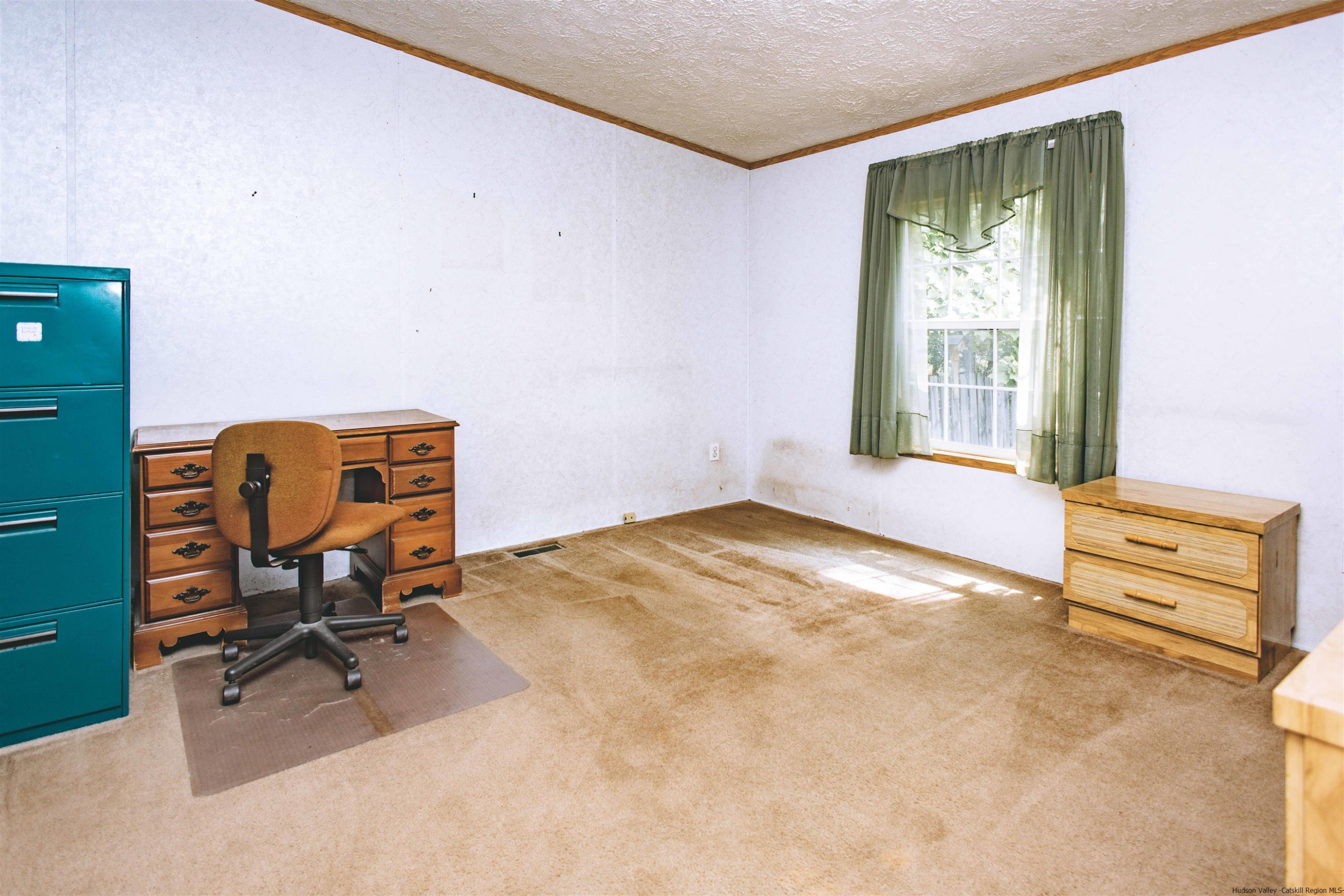 186 Patch Road Saugerties, NY 12477 - Photo 14 of 34 a view of a workspace with furniture and a window