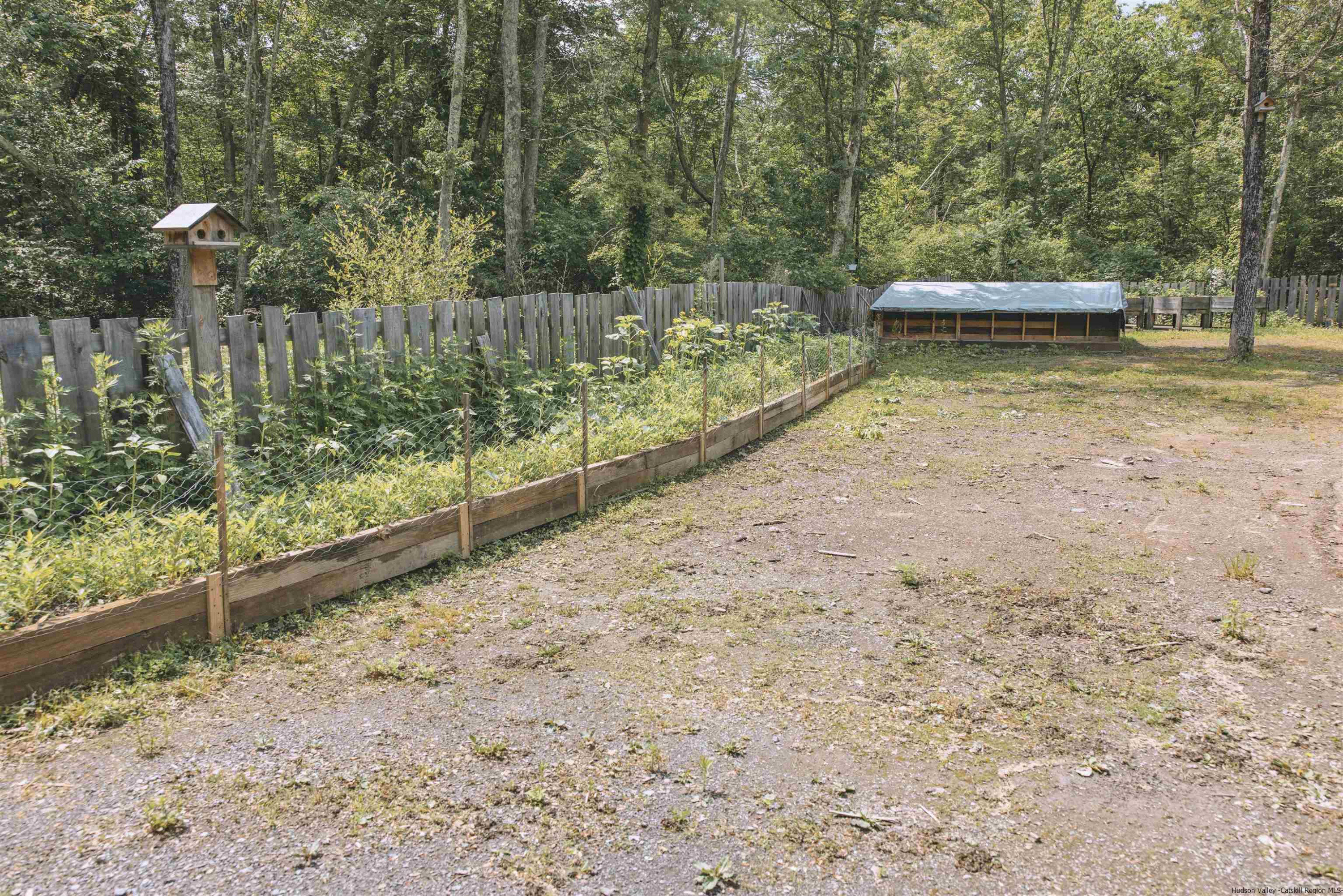 186 Patch Road Saugerties, NY 12477 - Photo 23 of 34 a view of a yard with wooden fence