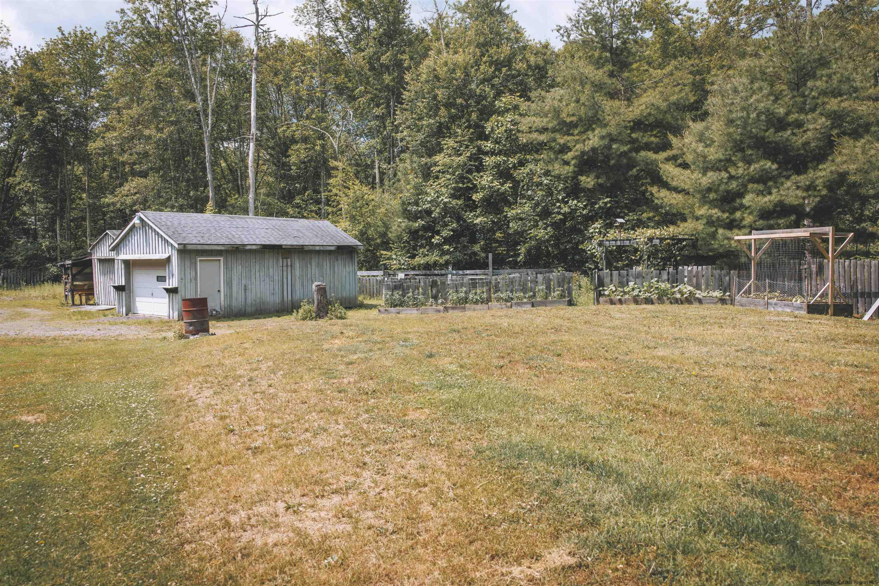 186 Patch Road Saugerties, NY 12477 - Photo 29 of 34 a house with trees in front of it