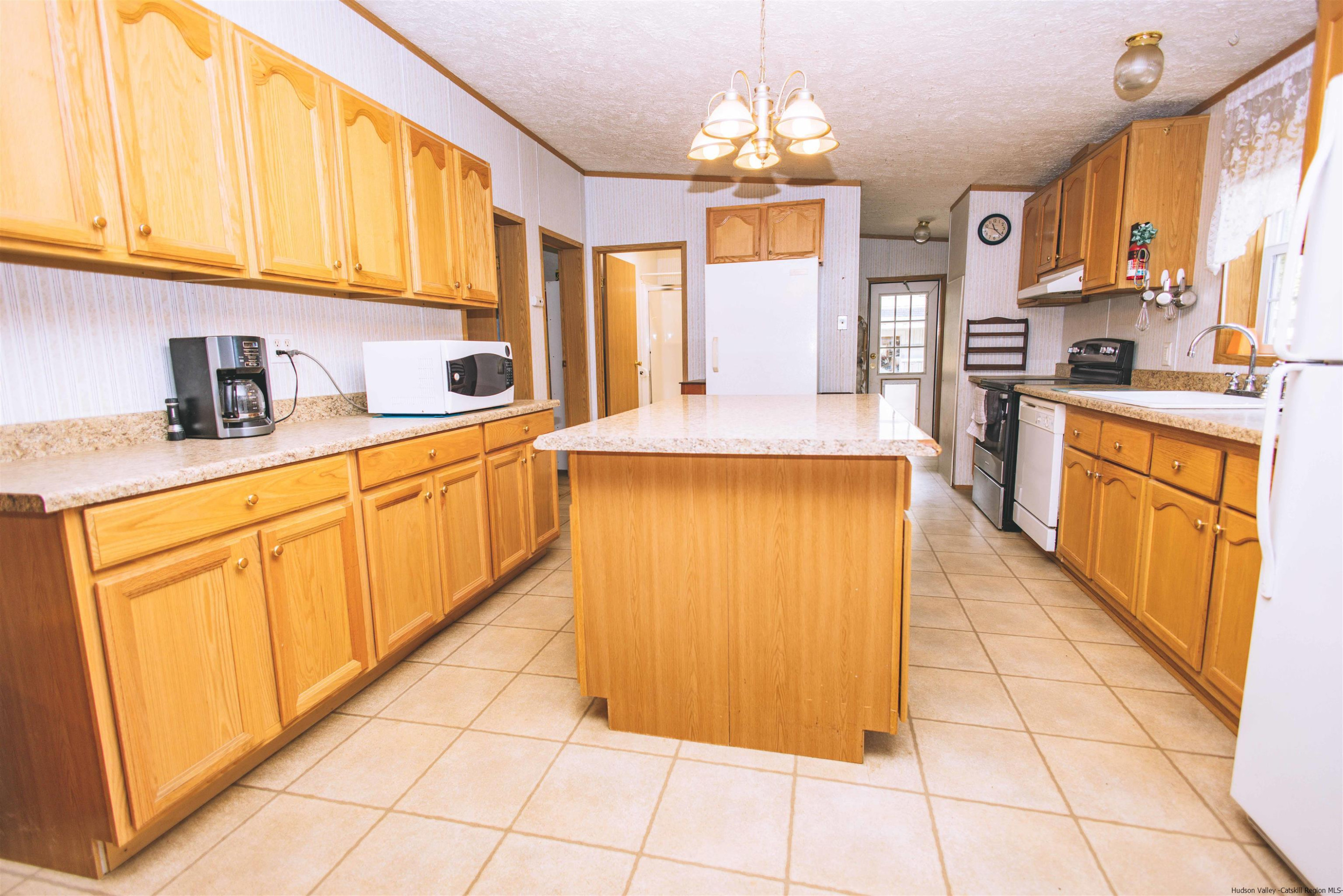 186 Patch Road Saugerties, NY 12477 - Photo 7 of 34 a large kitchen with stainless steel appliances granite countertop a stove a sink and a refrigerator