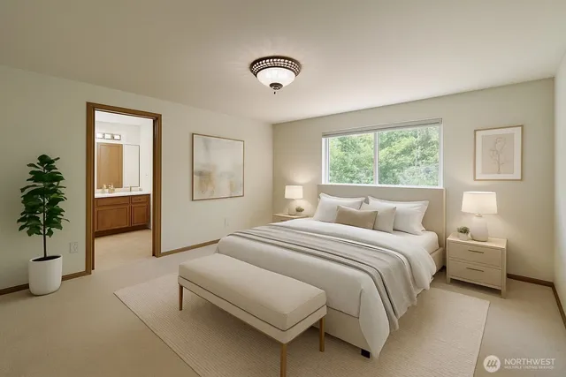 a bedroom with a bed and potted plant