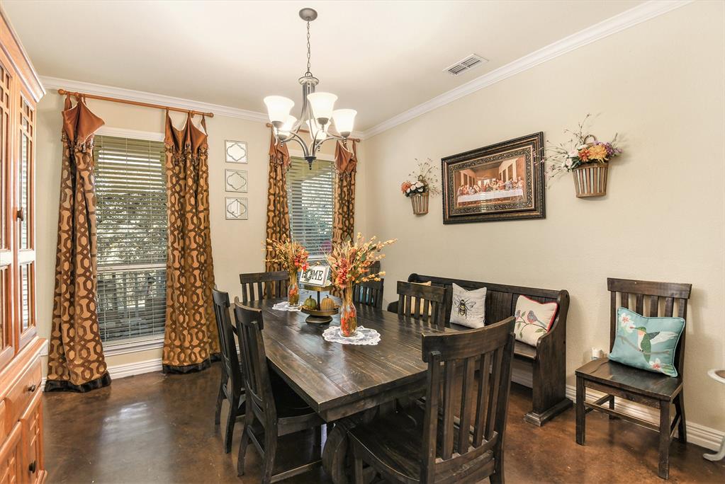 203 Saddle Ridge Court Springtown, TX 76082 - Photo 7 of 34 a view of a dining room with furniture window and outside view
