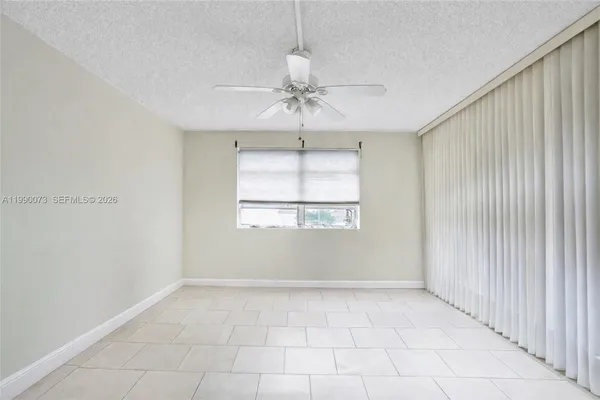 a view of building with yard