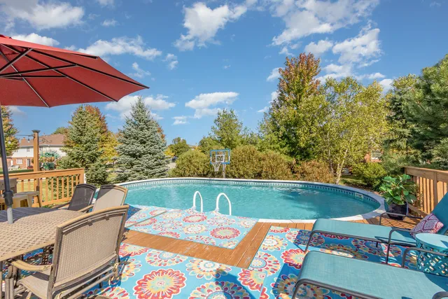 a view of outdoor space swimming pool and outdoor seating
