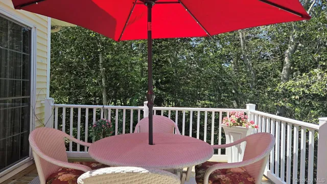 a view of a deck yard and patio