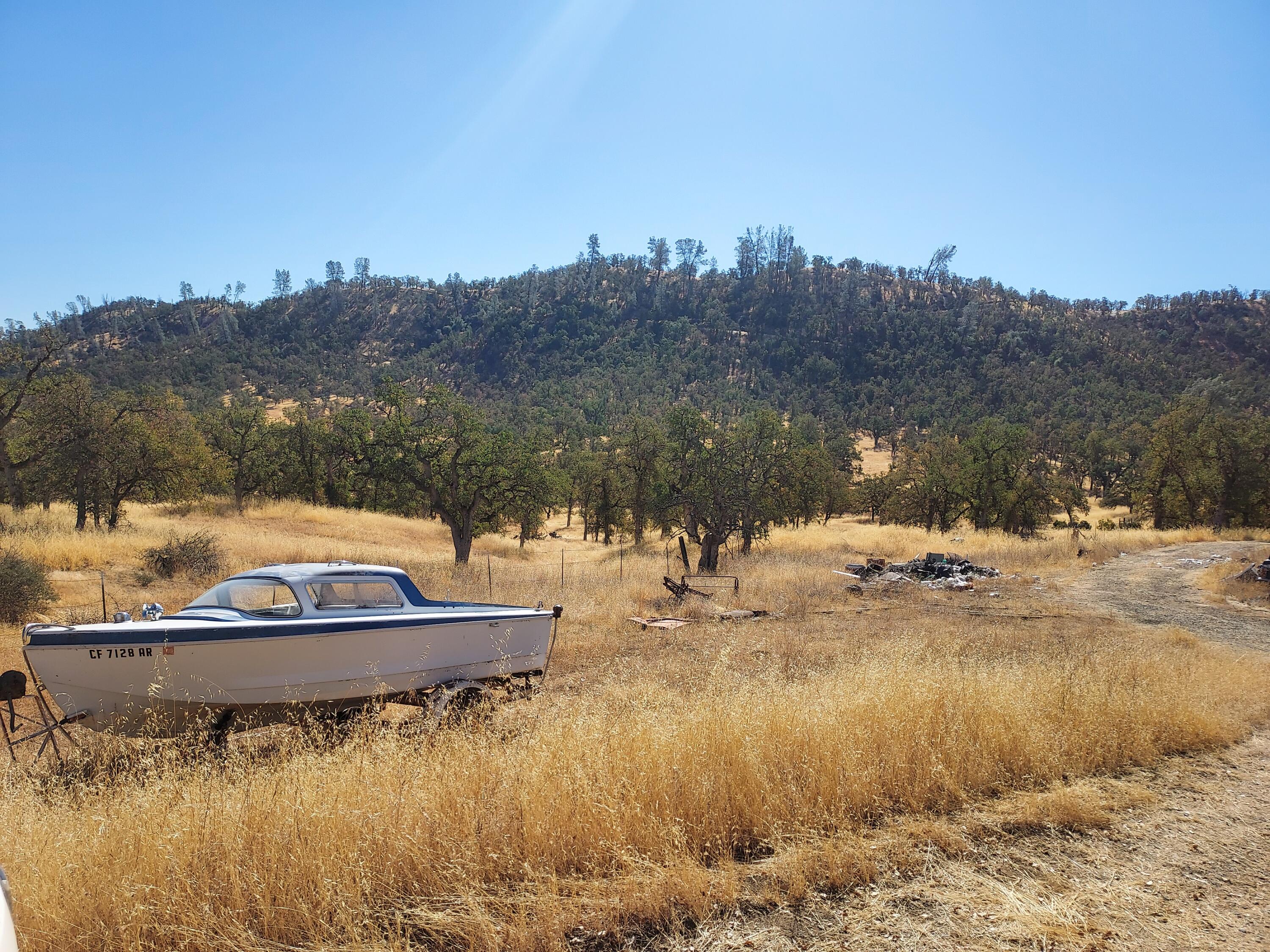 177 Fiddlers Road Igo, CA 96047 - Photo 23 of 26 a view of a lake from a yard