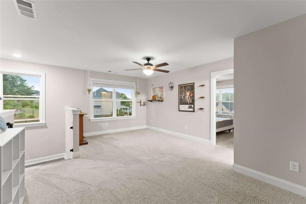 876 Sweetgrass Drive Demorest, GA 30535 - Photo 34 of 56 wooden floor in an empty room with a window