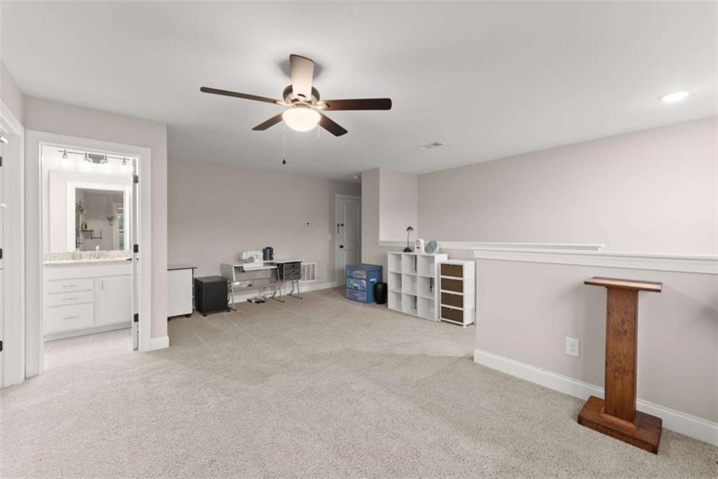 876 Sweetgrass Drive Demorest, GA 30535 - Photo 35 of 56 a view of a livingroom with a furniture and a ceiling fan