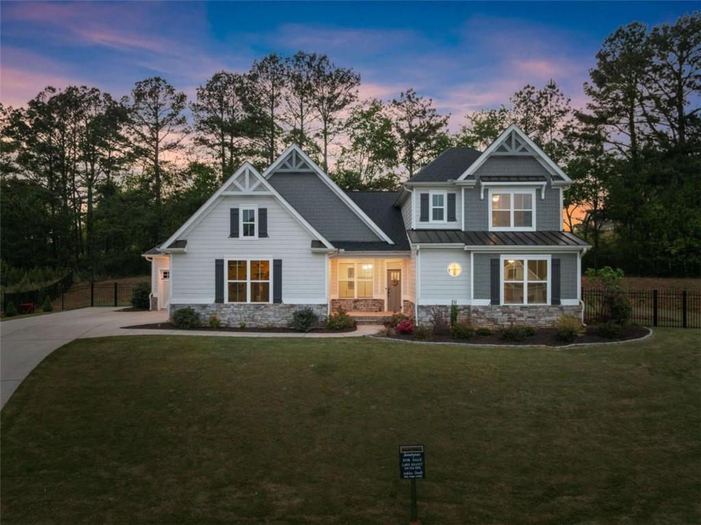 876 Sweetgrass Drive Demorest, GA 30535 - Photo 39 of 56 a front view of a house with a yard