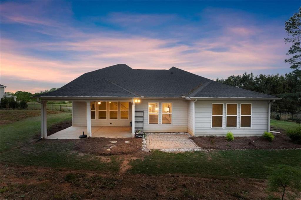 876 Sweetgrass Drive Demorest, GA 30535 - Photo 45 of 56 a front view of a house with a yard