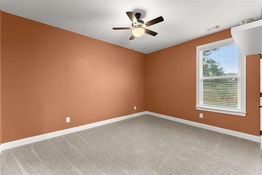 876 Sweetgrass Drive Demorest, GA 30535 - Photo 7 of 56 a view of an empty room with a window