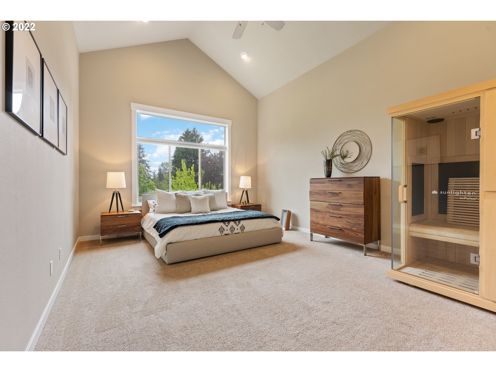 14026 Southwest 118th Court Tigard, OR 97224 - Photo 18 of 31 a spacious bedroom with a bed and a window