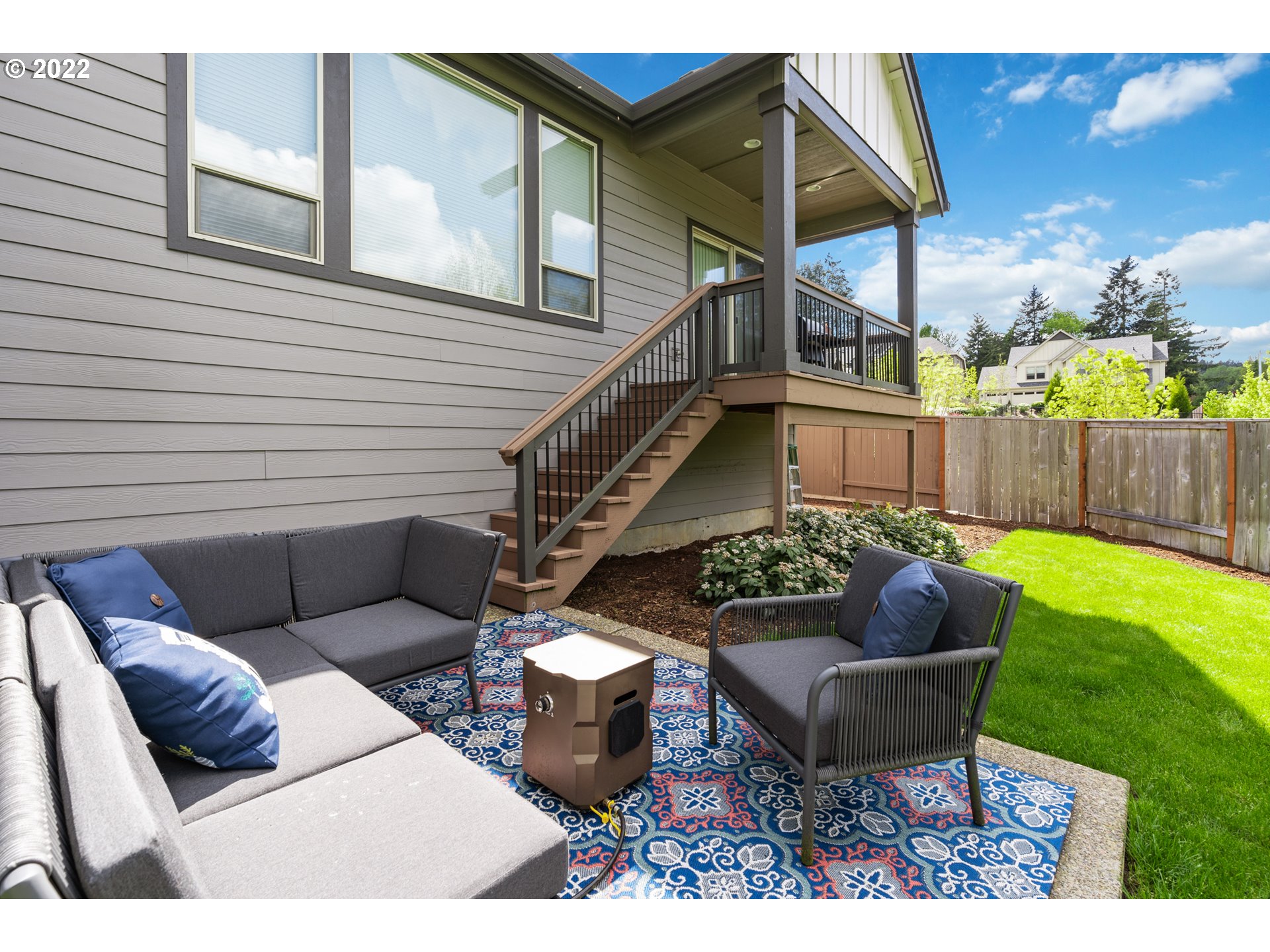 14026 Southwest 118th Court Tigard, OR 97224 - Photo 28 of 31 a view of a patio with couches table and chairs