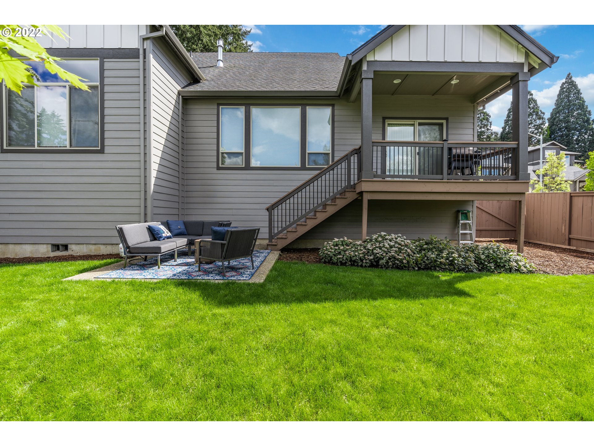 14026 Southwest 118th Court Tigard, OR 97224 - Photo 29 of 31 a view of a house with a yard and sitting area