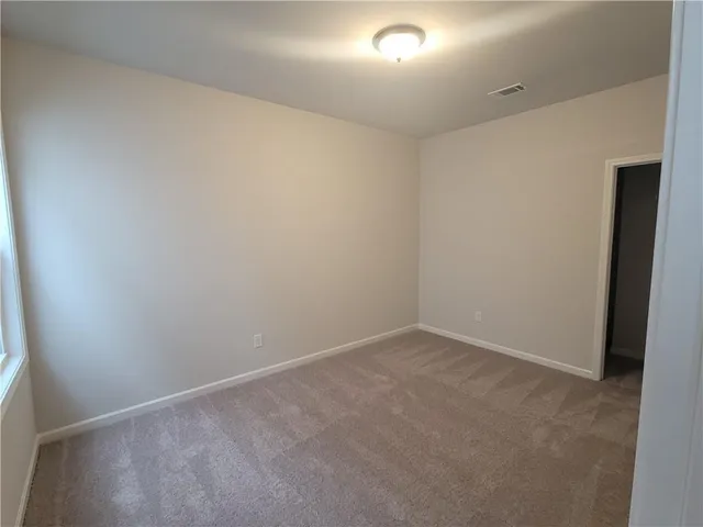 an empty room with a workbench