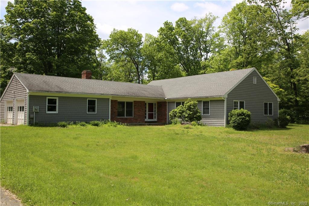 173 Stilson Hill Road New Milford, CT 06776 - Photo 1 of 1 a front view of a house with a garden