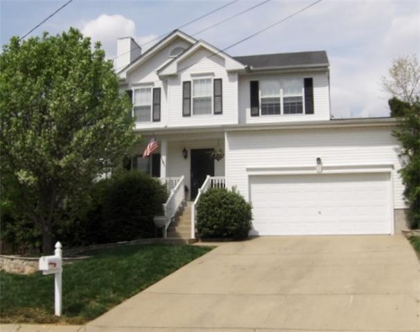 1000 Ridge Trail Goodlettsville, TN 37072 - Photo 1 of 24 a front view of a house with a yard