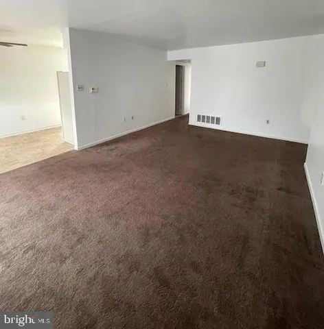 an empty room with an entryway