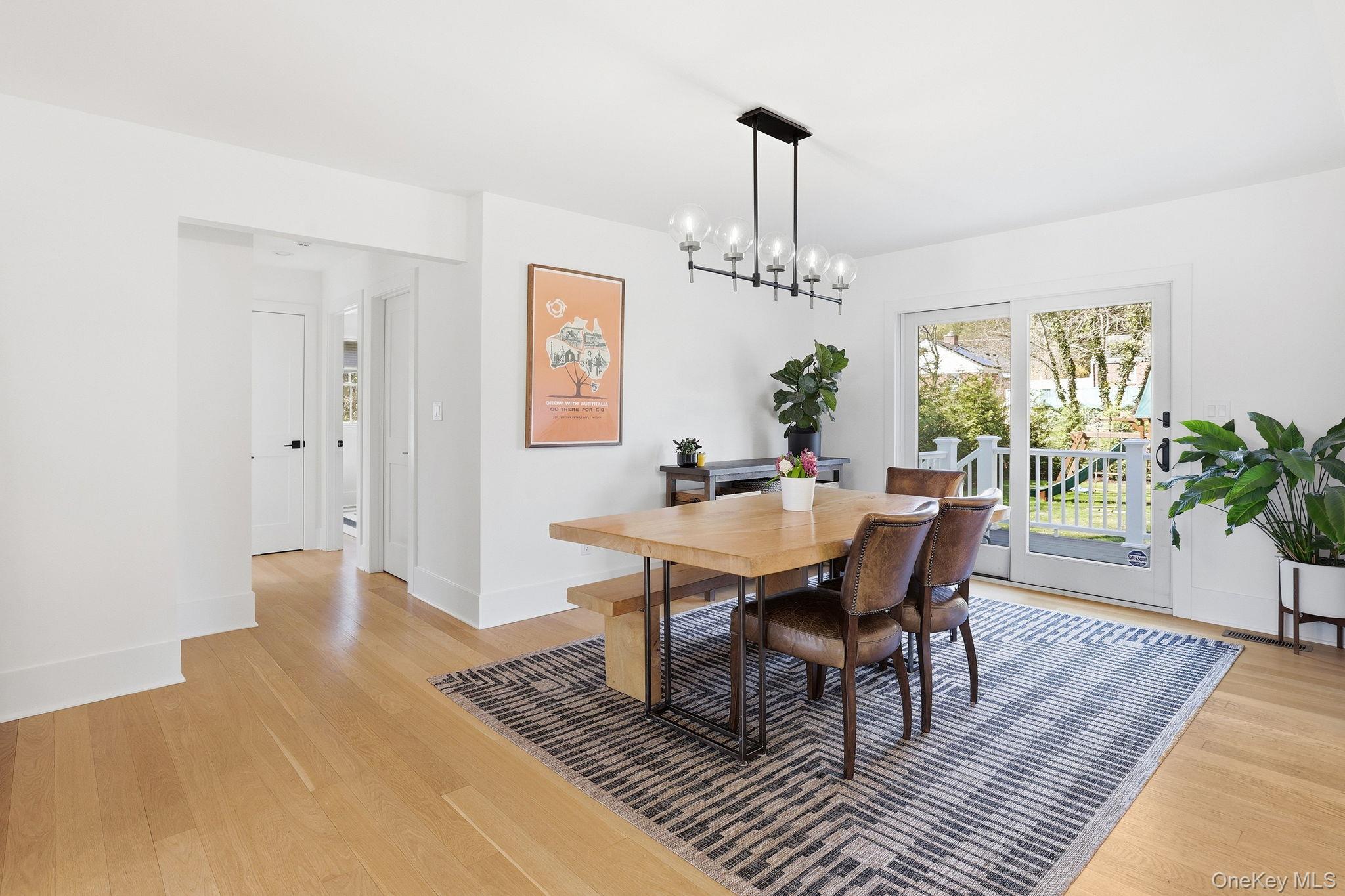 72 Valley Terrace Rye Brook, NY 10573 - Photo 12 of 32 a view of a dining room with furniture window and wooden floor
