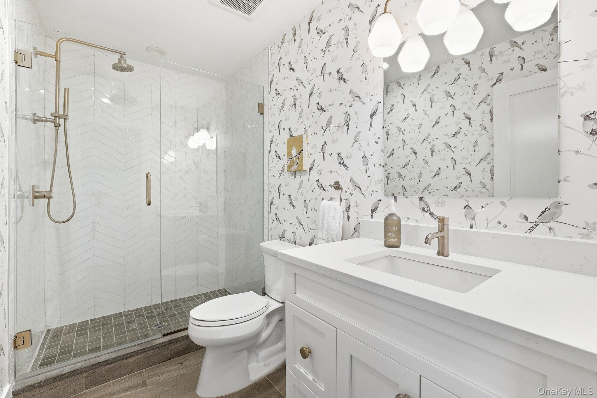 72 Valley Terrace Rye Brook, NY 10573 - Photo 14 of 32 a bathroom with a sink toilet and shower