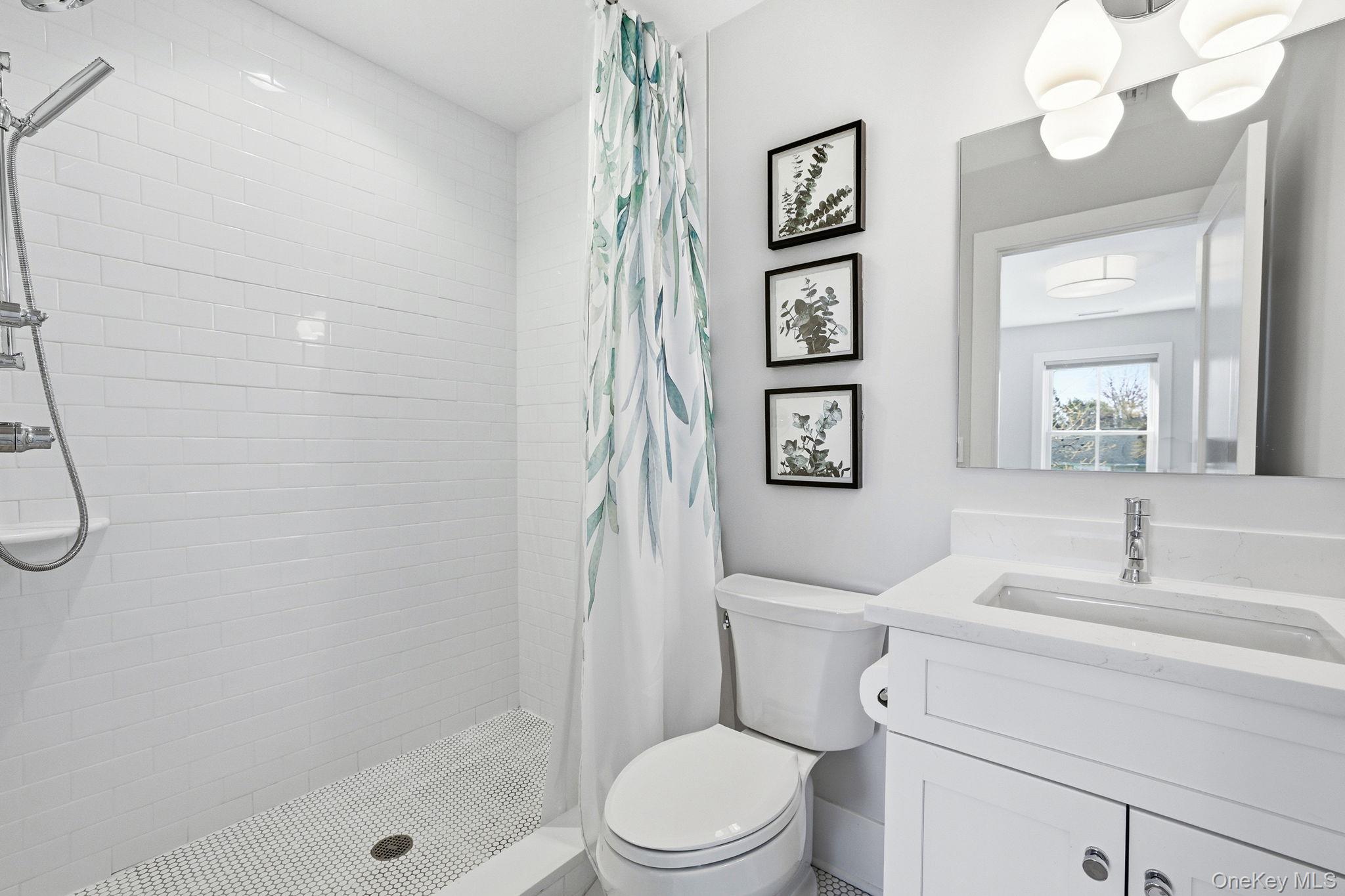 72 Valley Terrace Rye Brook, NY 10573 - Photo 20 of 32 a bathroom with a sink toilet and shower