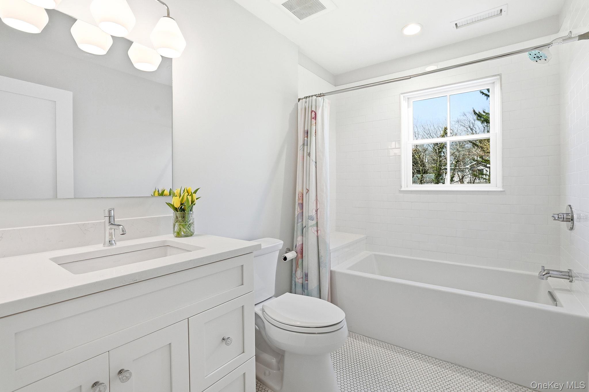 72 Valley Terrace Rye Brook, NY 10573 - Photo 22 of 32 a bathroom with a sink toilet and shower