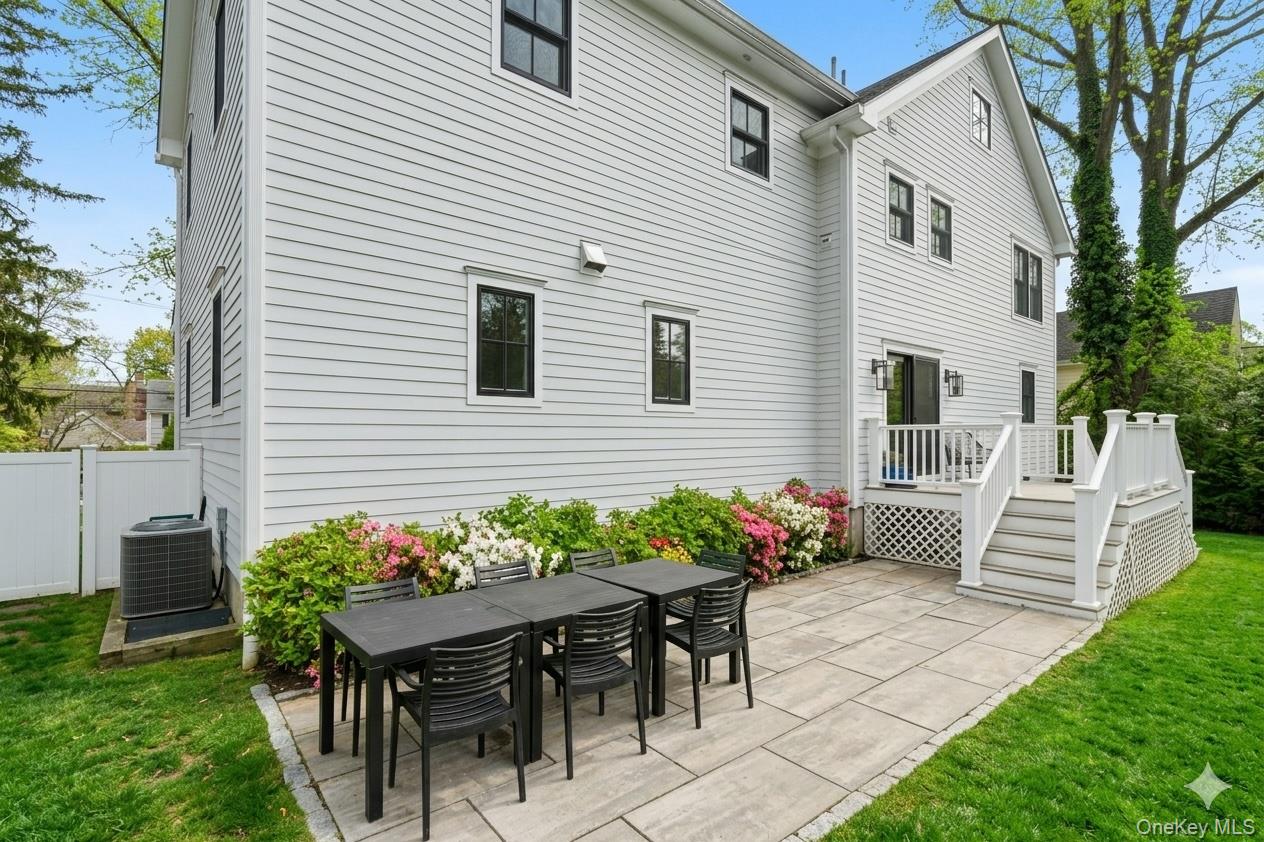 72 Valley Terrace Rye Brook, NY 10573 - Photo 29 of 32 a view of a house with a yard and sitting area