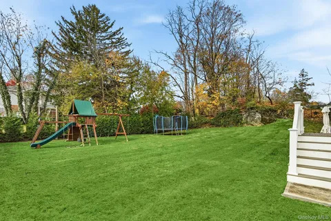 a view of a park with a slide