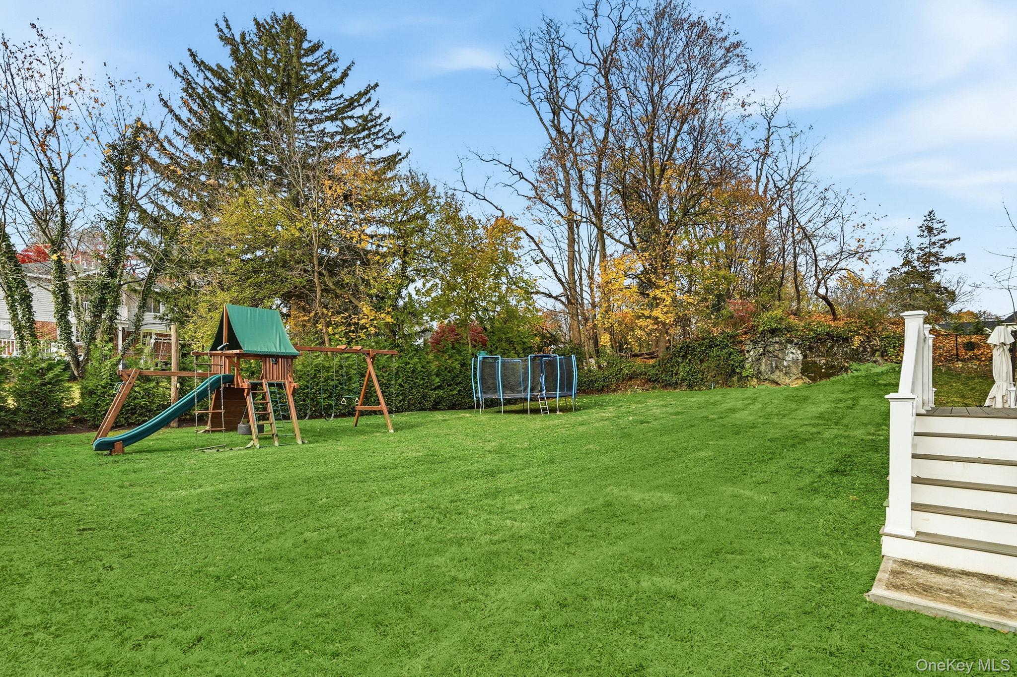 72 Valley Terrace Rye Brook, NY 10573 - Photo 3 of 32 a view of a park with a slide
