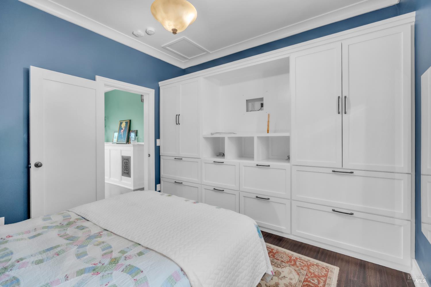 11 Jessup Street San Rafael, CA 94901 - Photo 20 of 54 a bedroom with a bed and cabinets